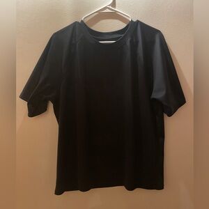 Nylon Men's Black Shirt 
Is good for swimming or exercise